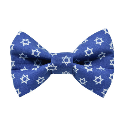 A blue dog bow tie with a Star of David pattern.
